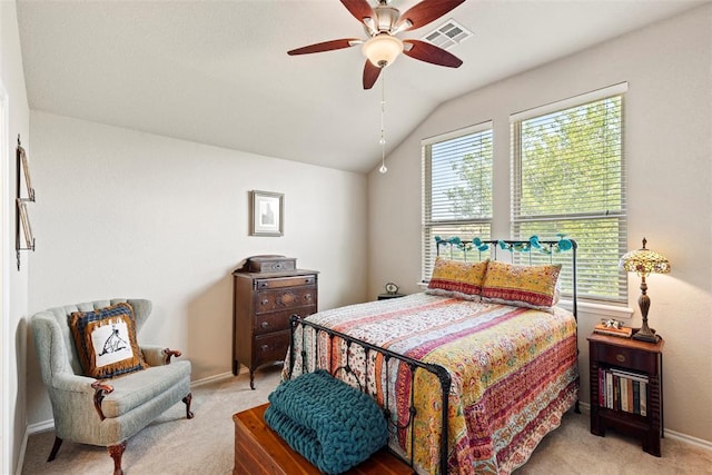 2321 NW 162nd Ter, Edmond, OK 73013 - bedroom with light colored carpet, lofted ceiling, and ceiling fan