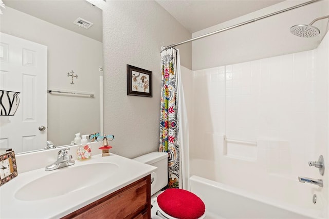 2321 NW 162nd Ter, Edmond, OK 73013 - bathroom with vanity, shower / tub combo with curtain, and a textured wall