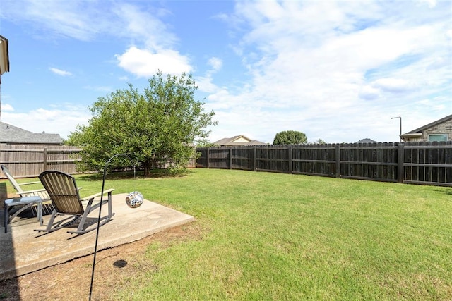 2321 NW 162nd Ter, Edmond, OK 73013 - fenced backyard with a patio area