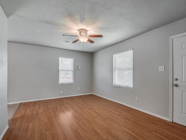 118 W Marshall Dr, Oklahoma City, OK 73110 - empty room featuring a ceiling fan and wood finished floors