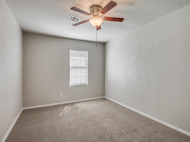 118 W Marshall Dr, Oklahoma City, OK 73110 - carpeted spare room featuring ceiling fan and a textured wall