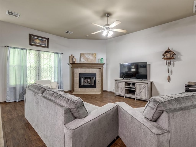749 Dana Dr, Yukon, OK 73099 - living room with wood finished floors, ceiling fan, and a fireplace