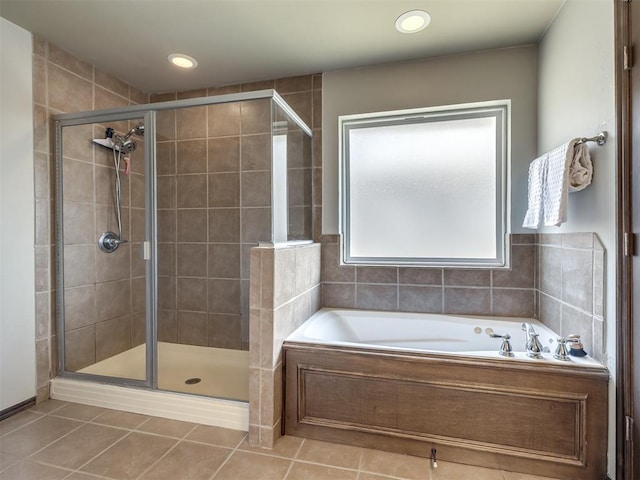 749 Dana Dr, Yukon, OK 73099 - bathroom featuring a bath, a stall shower, tile patterned floors, and recessed lighting