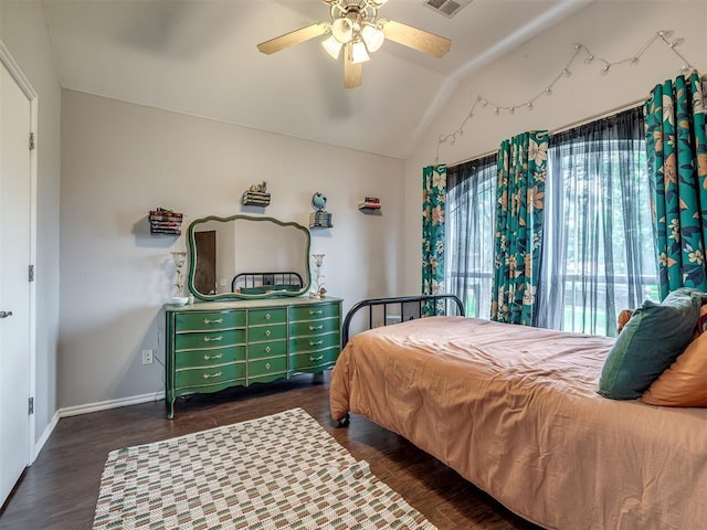 749 Dana Dr, Yukon, OK 73099 - bedroom featuring lofted ceiling, dark wood-type flooring, and a ceiling fan