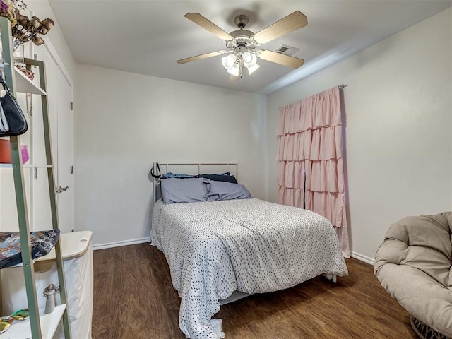 749 Dana Dr, Yukon, OK 73099 - bedroom featuring wood finished floors and ceiling fan