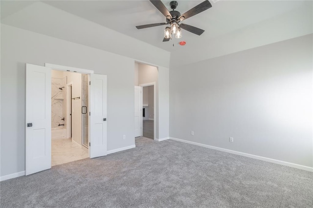 1224 Colonial Ave, Tuttle, OK 73089 - unfurnished bedroom with carpet, ensuite bath, and ceiling fan