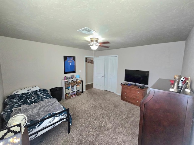 2015 Willard Dr, Altus, OK 73521 - carpeted bedroom featuring a closet and ceiling fan