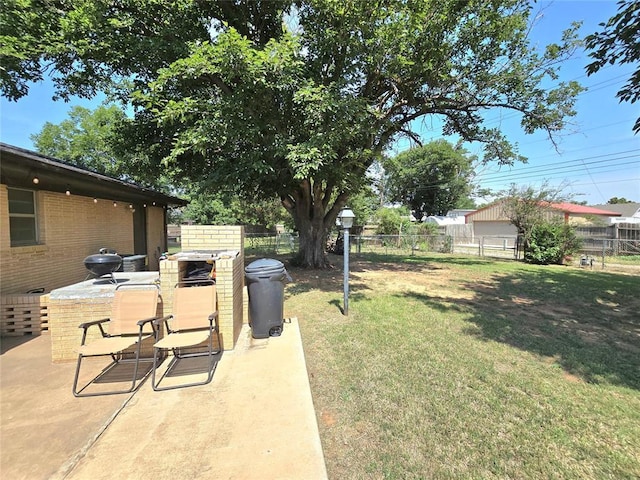 2015 Willard Dr, Altus, OK 73521 - fenced backyard featuring a patio