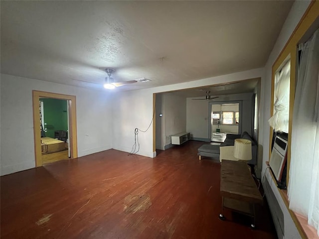 316 N University Blvd, Norman, OK 73069 - unfurnished living room with a ceiling fan, wood finished floors, and a fireplace