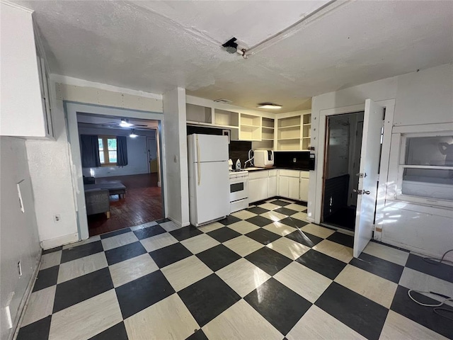 316 N University Blvd, Norman, OK 73069 - kitchen featuring white appliances, open shelves, light floors, and dark countertops