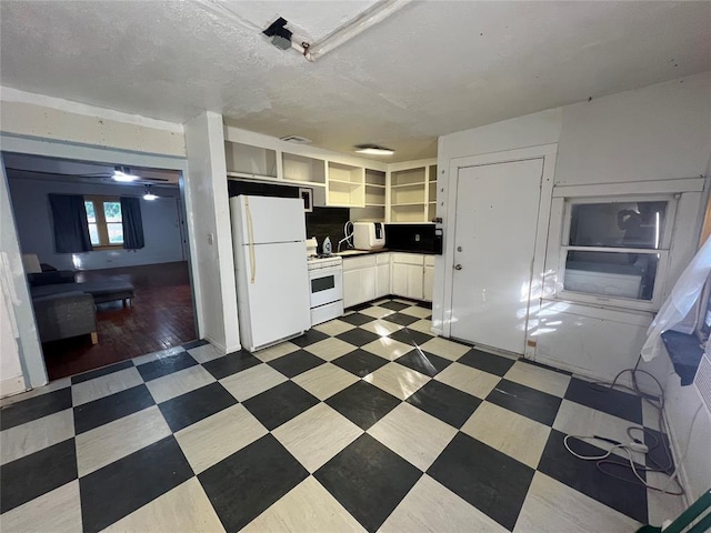 316 N University Blvd, Norman, OK 73069 - kitchen featuring white appliances, open shelves, light floors, and dark countertops