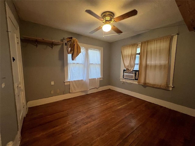 316 N University Blvd, Norman, OK 73069 - unfurnished bedroom with dark wood-type flooring, cooling unit, and a ceiling fan