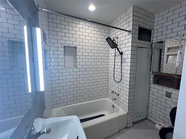316 N University Blvd, Norman, OK 73069 - bathroom featuring tile patterned flooring, washtub / shower combination, and tile walls