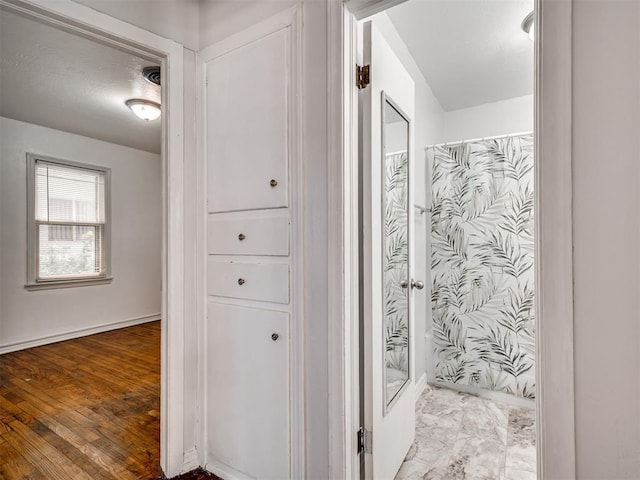 2713 S Glenn Ave, Del City, OK 73115 - bathroom featuring baseboards and curtained shower