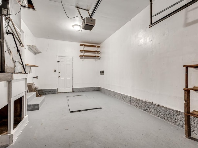 2713 S Glenn Ave, Del City, OK 73115 - garage featuring a garage door opener