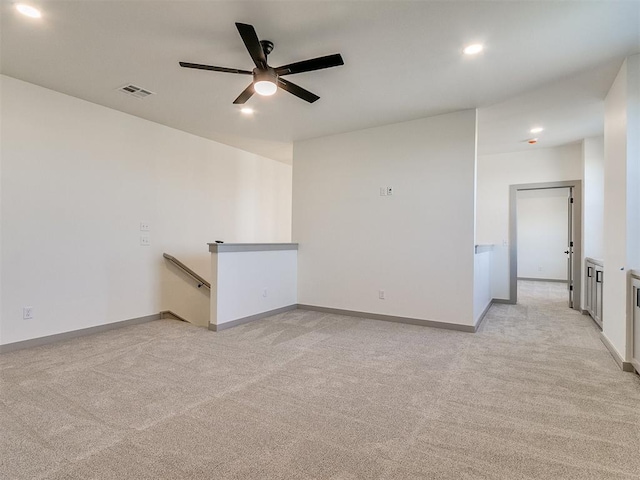 2741 Two Socks Run, Guthrie, OK 73044 - empty room with light colored carpet, ceiling fan, and recessed lighting