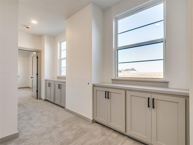 2741 Two Socks Run, Guthrie, OK 73044 - corridor with light colored carpet and baseboards