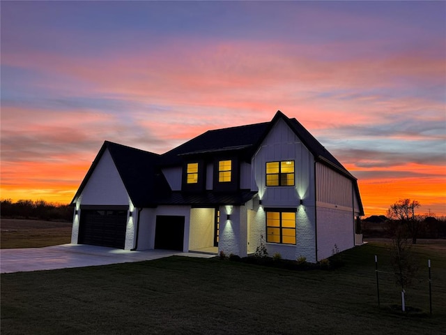 2741 Two Socks Run, Guthrie, OK 73044 - modern farmhouse style home with a front yard, driveway, a metal roof, and a standing seam roof