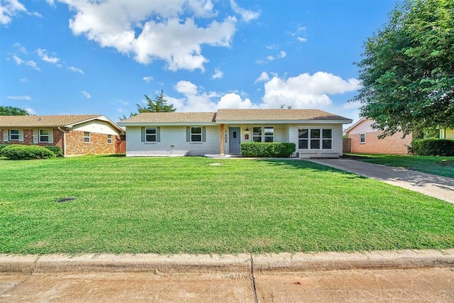 1608 Truman Dr, Altus, OK 73521 - ranch-style house with a front lawn and brick siding