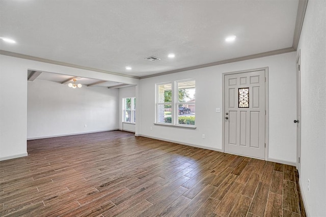 1608 Truman Dr, Altus, OK 73521 - foyer featuring wood finished floors, ornamental molding, recessed lighting, and beam ceiling