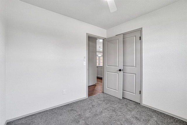 1608 Truman Dr, Altus, OK 73521 - unfurnished bedroom with carpet flooring and a ceiling fan