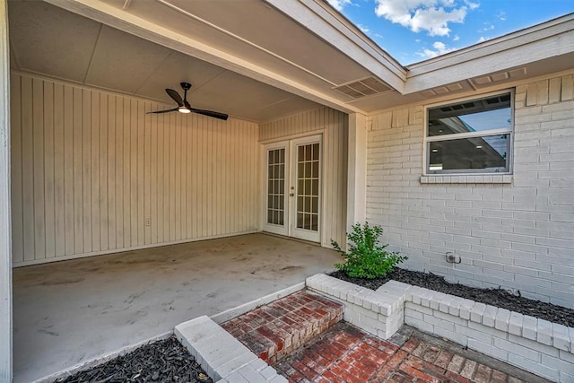 1608 Truman Dr, Altus, OK 73521 - entrance to property featuring french doors, ceiling fan, a patio, and brick siding