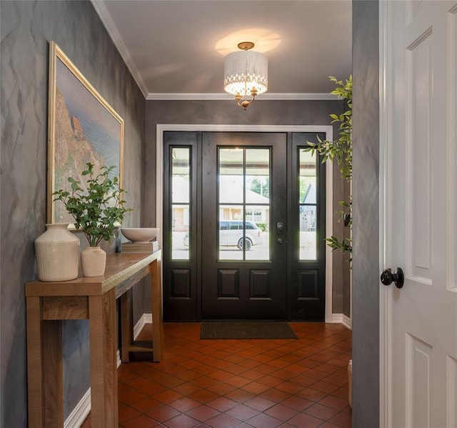 1503 Brighton Ave, Oklahoma City, OK 73120 - tiled foyer with a chandelier and ornamental molding