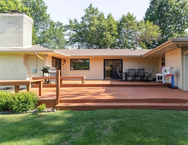 1503 Brighton Ave, Oklahoma City, OK 73120 - deck with outdoor dining area, a yard, and grilling area