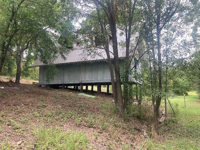 18792 W State Highway 3, Wright City, OK 74745 - view of side of home with a metal roof
