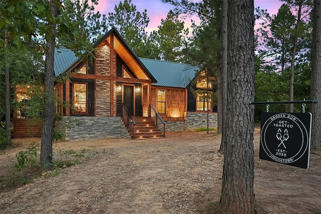 42 Hickory Ridge Rd, Broken Bow, OK 74728 - view of front of home with a metal roof and stone siding