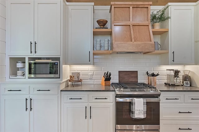 42 Hickory Ridge Rd, Broken Bow, OK 74728 - kitchen featuring open shelves, appliances with stainless steel finishes, decorative backsplash, and white cabinetry