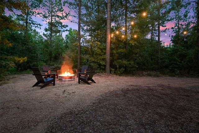 42 Hickory Ridge Rd, Broken Bow, OK 74728 - view of yard with an outdoor fire pit