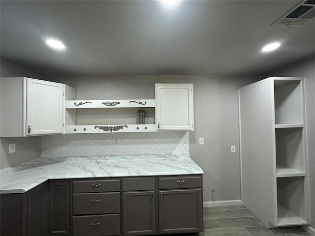 112 Burk Way, Del City, OK 73115 - kitchen featuring open shelves, white cabinets, tasteful backsplash, light stone countertops, and recessed lighting