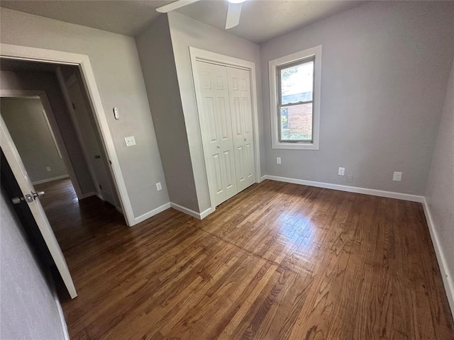 112 Burk Way, Del City, OK 73115 - unfurnished bedroom with wood finished floors and a closet