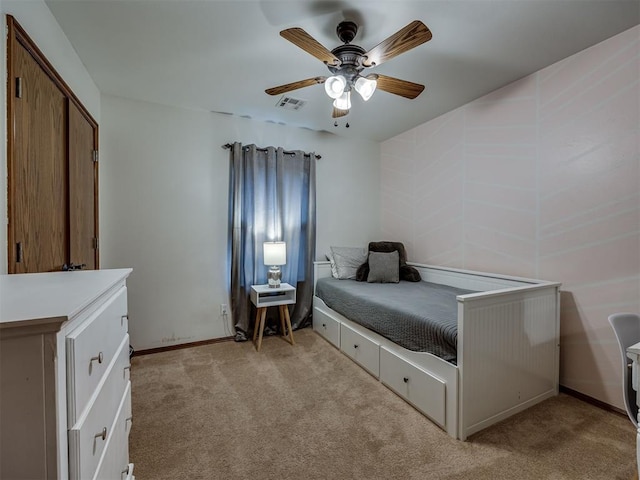 2108 Mulberry Creek Ave, Yukon, OK 73099 - bedroom with light carpet and a ceiling fan