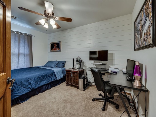2108 Mulberry Creek Ave, Yukon, OK 73099 - bedroom with carpet flooring, wood walls, an office area, and a ceiling fan