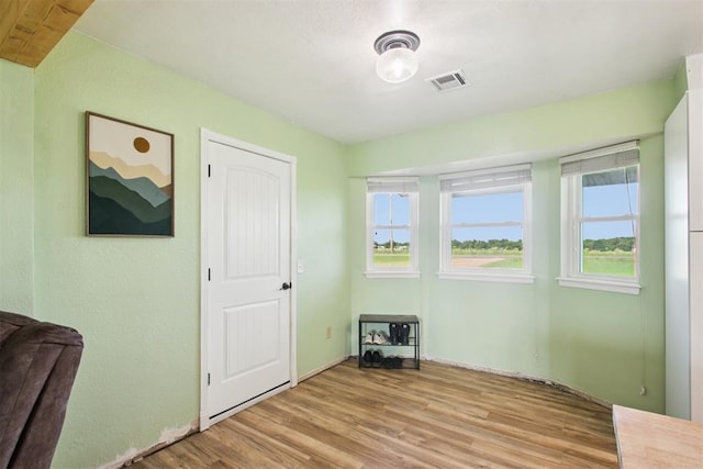 870 S Cemetery Rd Unit 2940, Tuttle, OK 73089 - unfurnished bedroom featuring wood finished floors