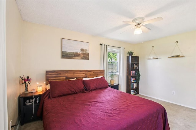870 S Cemetery Rd Unit 2940, Tuttle, OK 73089 - carpeted bedroom with ceiling fan and a textured ceiling