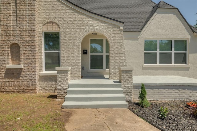 1109 NE 17th St, Oklahoma City, OK 73111 - entrance to property with stucco siding and a shingled roof