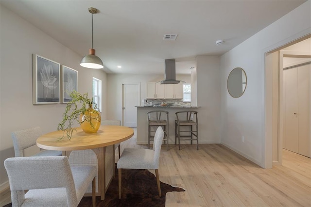 1109 NE 17th St, Oklahoma City, OK 73111 - dining space featuring light wood-style flooring, healthy amount of natural light, and recessed lighting