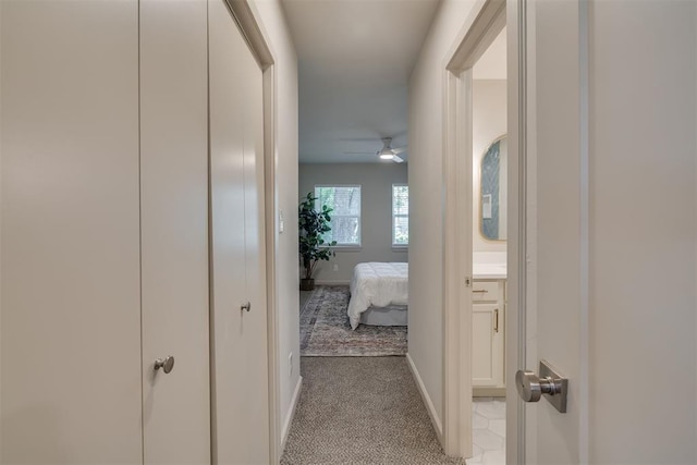 1109 NE 17th St, Oklahoma City, OK 73111 - corridor with baseboards and carpet flooring