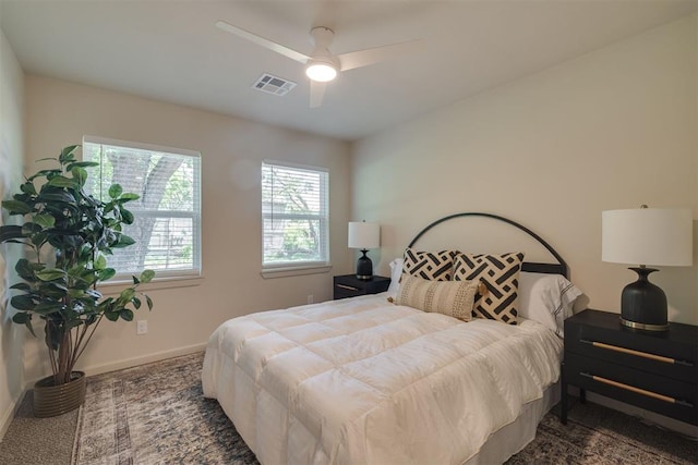 1109 NE 17th St, Oklahoma City, OK 73111 - carpeted bedroom with baseboards and ceiling fan