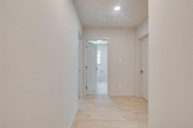1109 NE 17th St, Oklahoma City, OK 73111 - hallway featuring light wood-type flooring and baseboards