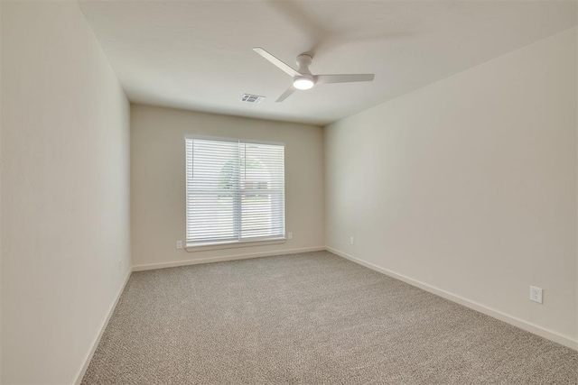1109 NE 17th St, Oklahoma City, OK 73111 - empty room with ceiling fan and light carpet