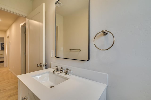 1109 NE 17th St, Oklahoma City, OK 73111 - bathroom with wood finished floors and vanity