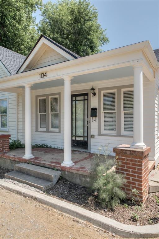 1134 NW 40th St, Oklahoma City, OK 73118 - neoclassical / greek revival house with a porch and roof with shingles