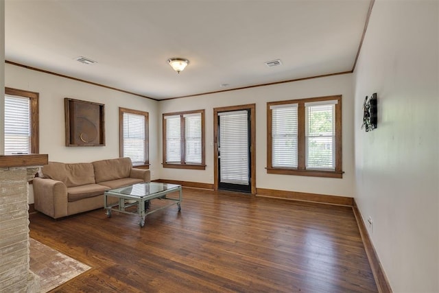 1134 NW 40th St, Oklahoma City, OK 73118 - living area featuring wood finished floors and crown molding