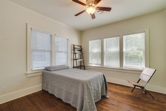 1134 NW 40th St, Oklahoma City, OK 73118 - bedroom featuring ornamental molding, dark wood-style floors, and a ceiling fan