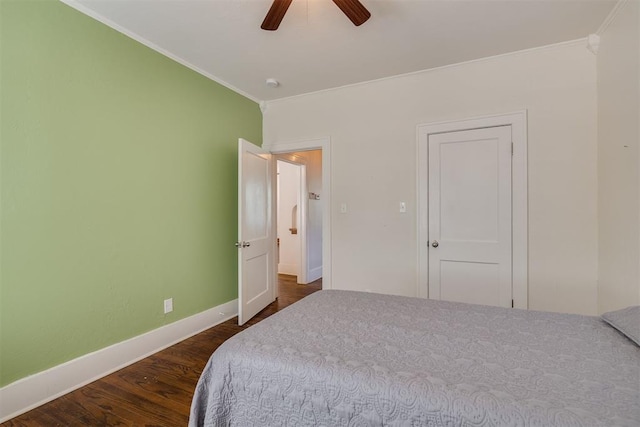 1134 NW 40th St, Oklahoma City, OK 73118 - bedroom with ornamental molding, dark wood finished floors, and ceiling fan