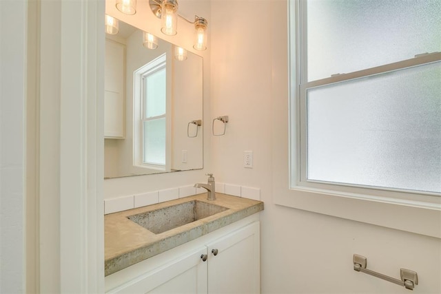 1134 NW 40th St, Oklahoma City, OK 73118 - bathroom with vanity and healthy amount of natural light